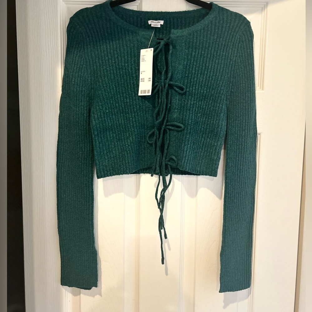 Urban Outfitters, NWT, Green Sweater Sits at Waist, criss cross tie